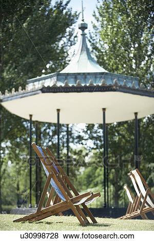 Gazebo And Deck Chairs In Hyde Park, London, England View Large Photo Image Stock Photo - Gazebo And Deck Chairs In Hyde Park, London, England. Fotosearch