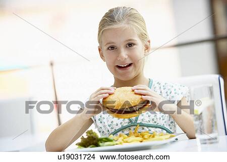 Girl Eating Lunch At A Cafe View Large Photo Image Picture - Girl Eating Lunch At A Cafe. Fotosearch