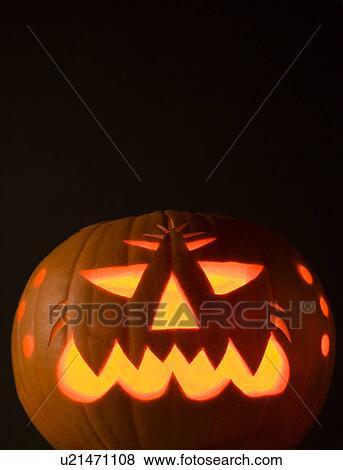 Stock Photo - Glowing Jack O'Lantern. Fotosearch