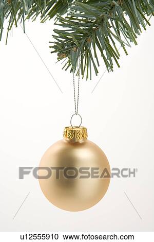 Gold Christmas Decoration Hanging From Tree Against White Background View Large Photo Image Stock Image - Gold Christmas Decoration Hanging From Tree Against White Background. Fotosearch