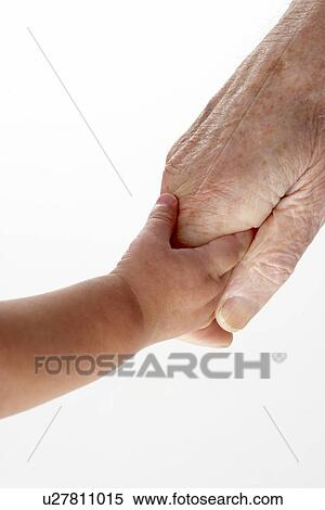 Stock Photography - Grandfather and granddaughter holding hands. Fotosearch