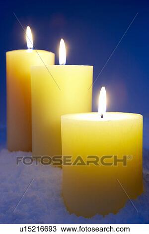 Group Of Lit Candles In Snow View Large Photo Image Stock Image - Group Of Lit Candles In Snow. Fotosearch