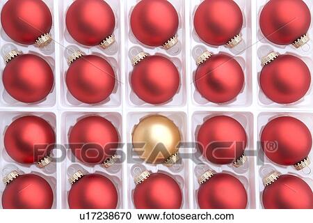 Stock Image - Group Of Red And Gold Christmas Baubles In Box. Fotosearch
