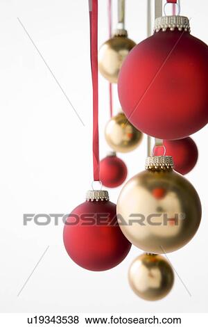 Stock Photo - Group Of Red And Gold Christmas Decorations. Fotosearch