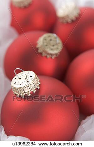 Group Of Red Christmas Tree Decorations Wrapped In Tissue Paper View Large Photo Image Picture - Group Of Red Christmas Tree Decorations Wrapped In Tissue Paper. Fotosearch