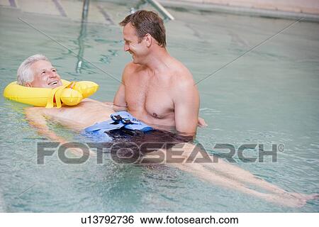 Instructor And Patient Undergoing Water Therapy View Large Photo Image Stock Photograph - Instructor And Patient Undergoing Water Therapy. Fotosearch