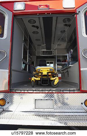 Stock Photo - Interior of empty ambulance and gurney. Fotosearch