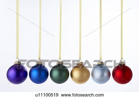Line Of Christmas Baubles Against White Background View Large Photo Image Stock Photo - Line Of Christmas Baubles Against White Background. Fotosearch