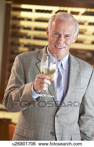 Man Having A Drink At A Bar View Large Photo Image Stock Photograph - Man Having A Drink At A Bar. Fotosearch