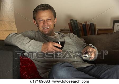 Man With Glass Of Wine Watching Television View Large Photo Image Stock Image - Man With Glass Of Wine Watching Television. Fotosearch