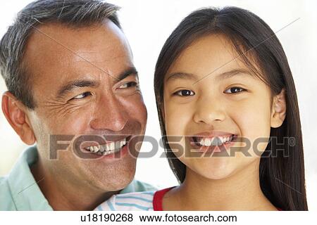 Stock Photo - Man With His Young Daughter. Fotosearch