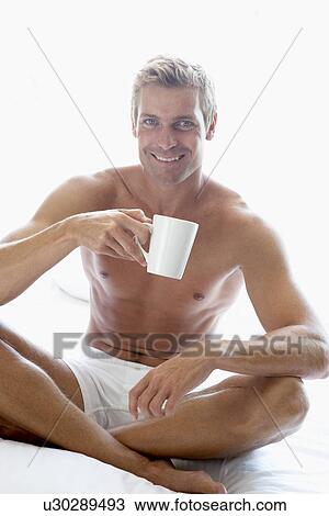 Mid Adult Man Drinking Coffee View Large Photo Image Stock Image - Mid Adult Man Drinking Coffee. Fotosearch