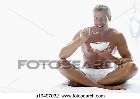 Mid Adult Man Eating Breakfast View Large Photo Image Stock Image - Mid Adult Man Eating Breakfast. Fotosearch
