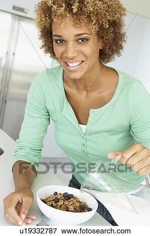 Mid Adult Woman Eating Healthy Breakfast View Large Photo Image Stock Photo - Mid Adult Woman Eating Healthy Breakfast. Fotosearch