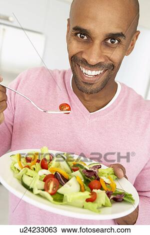Middle Aged Man Eating A Salad View Large Photo Image Stock Image - Middle Aged Man Eating A Salad. Fotosearch