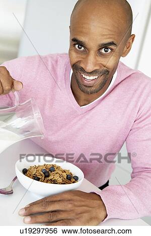Middle Aged Man Eating Healthy Breakfast View Large Photo Image Stock Photograph - Middle Aged Man Eating Healthy Breakfast. Fotosearch