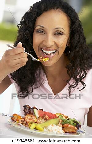 Middle Aged Woman Dining Al Fresco View Large Photo Image Stock Image - Middle Aged Woman Dining Al Fresco. Fotosearch