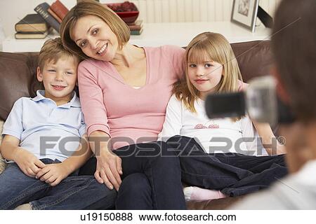 Mother And Children On Sofa Being Filmed On Video Camera View Large Photo Image Stock Photo - Mother And Children On Sofa Being Filmed On Video Camera. Fotosearch