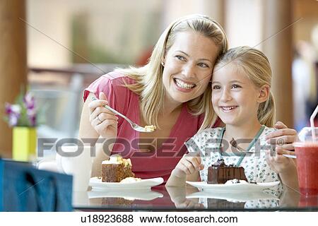 Mother And Daughter Having Lunch Together At The Mall View Large Photo Image Stock Photo - Mother And Daughter Having Lunch Together At The Mall. Fotosearch
