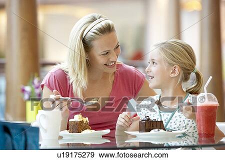 Mother And Daughter Having Lunch Together At The Mall View Large Photo Image Stock Photo - Mother And Daughter Having Lunch Together At The Mall. Fotosearch