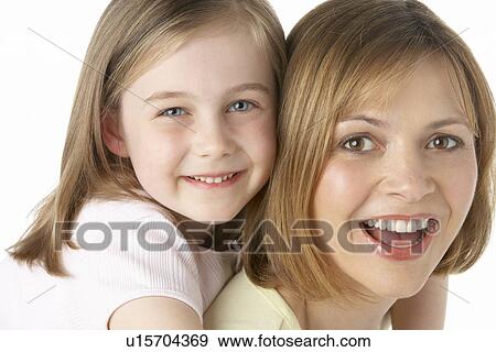 Stock Photo - Mother And Daughter Smiling. Fotosearch