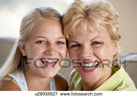 Stock Photo - Mother And Daughter Together At Home. Fotosearch