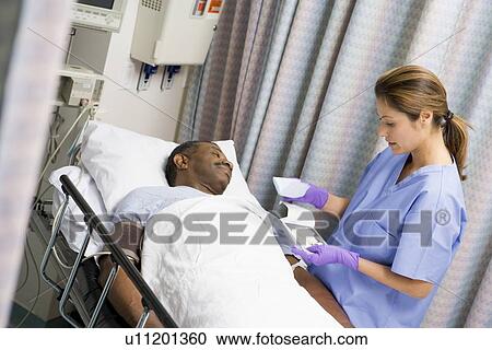Nurse Caring For Patient View Large Photo Image Stock Image - Nurse Caring For Patient. Fotosearch
