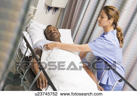 Nurse Caring For Patient View Large Photo Image Stock Image - Nurse Caring For Patient. Fotosearch