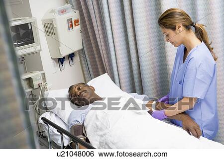 Nurse Caring For Patient View Large Photo Image Stock Photograph - Nurse Caring For Patient. Fotosearch
