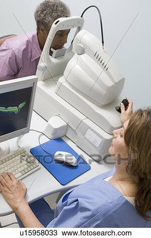 Nurse Checking Patient's Eyes View Large Photo Image Stock Image - Nurse Checking Patient's Eyes. Fotosearch