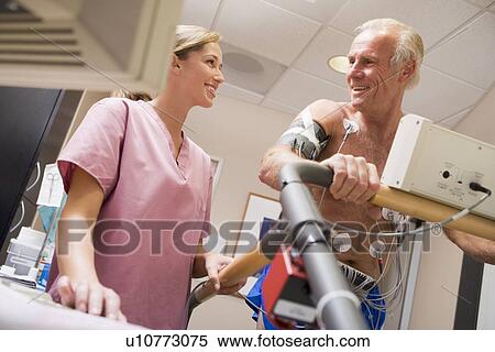 Nurse With Patient During Health Check View Large Photo Image Stock Photography - Nurse With Patient During Health Check. Fotosearch