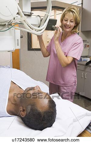 Nurse With Patient Having An X-Ray View Large Photo Image Stock Image - Nurse With Patient Having An X-Ray. Fotosearch
