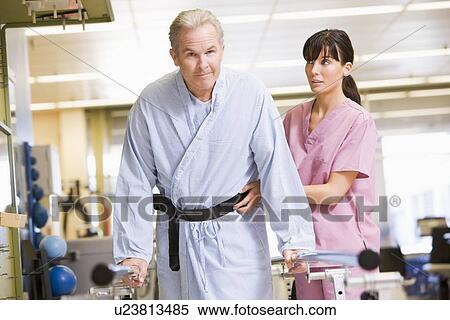 Nurse With Patient In Rehabilitation View Large Photo Image Stock Photography - Nurse With Patient In Rehabilitation. Fotosearch