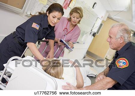 Paramedics Rushing Emergency Patient Into Hospital View Large Photo Image Stock Photograph - Paramedics Rushing Emergency Patient Into Hospital. Fotosearch