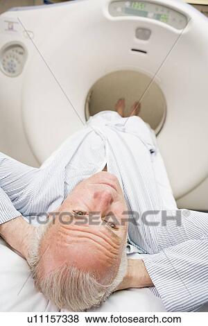 Stock Photo - Patient About To Have A Computerized Axial Tomography (CAT) Scan. Fotosearch