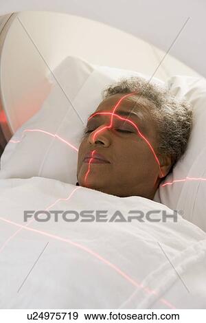 Stock Photo - Patient Having A Computerized Axial Tomography (CAT) Scan. Fotosearch
