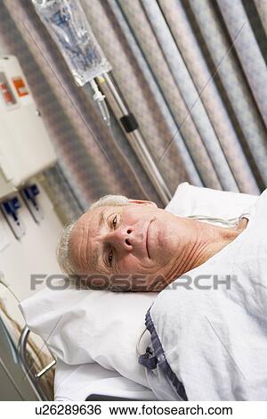 Stock Photograph - Patient In Hospital Bed . Fotosearch