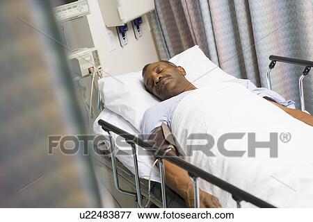 Patient Sleeping In Hospital Bed View Large Photo Image Stock Photo - Patient Sleeping In Hospital Bed . Fotosearch