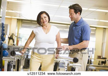Physiotherapist With Patient In Rehabilitation View Large Photo Image Picture - Physiotherapist With Patient In Rehabilitation. Fotosearch