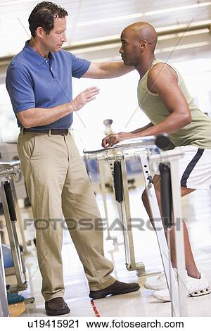 Physiotherapist With Patient In Rehabilitation View Large Photo Image Stock Image - Physiotherapist With Patient In Rehabilitation. Fotosearch