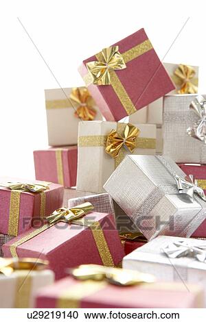 Pile Of Christmas Presents Against White Background View Large Photo Image Stock Image - Pile Of Christmas Presents Against White Background. Fotosearch