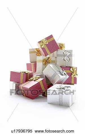 Pile Of Christmas Presents Against White Background View Large Photo Image Stock Photography - Pile Of Christmas Presents Against White Background. Fotosearch