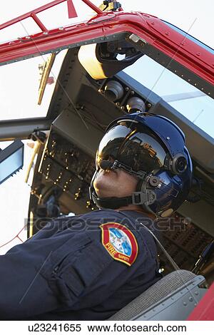 Stock Photography - Pilot flying Medevac. Fotosearch