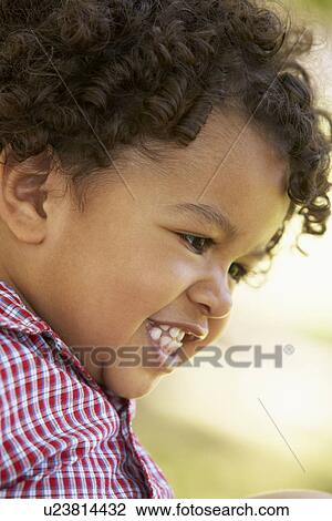 Stock Image - Portrait Of Baby Boy Smiling. Fotosearch