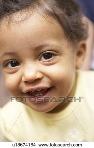 Picture - Portrait Of Baby Girl Smiling. Fotosearch