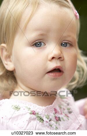 Stock Image - Portrait Of Baby Girl. Fotosearch
