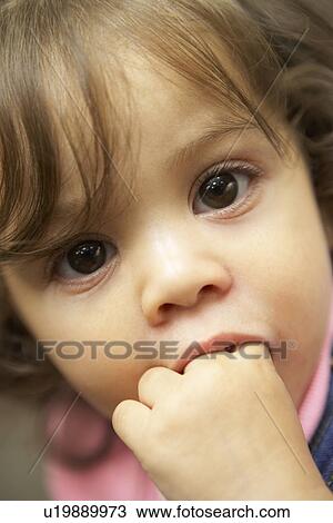 Stock Image - Portrait Of Baby Girl. Fotosearch