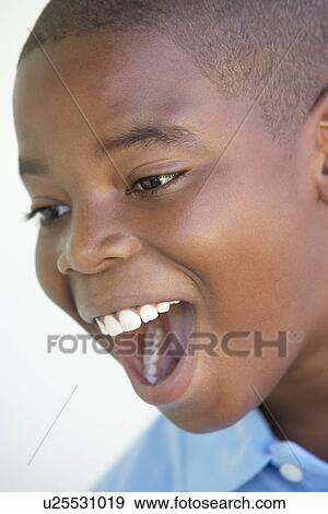Stock Photo - Portrait Of Boy Looking Excited. Fotosearch