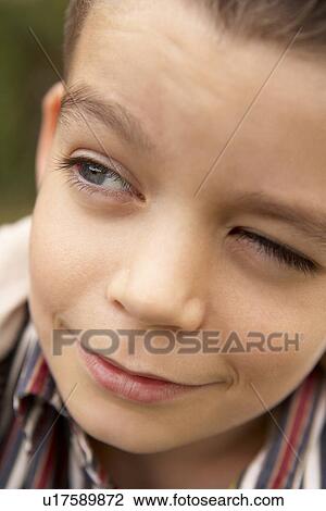 Stock Image - Portrait Of Boy Looking Hopeful. Fotosearch