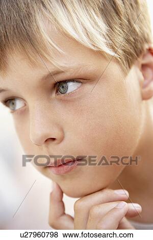 Portrait Of Boy Looking Pensive View Large Photo Image Stock Photo - Portrait Of Boy Looking Pensive. Fotosearch